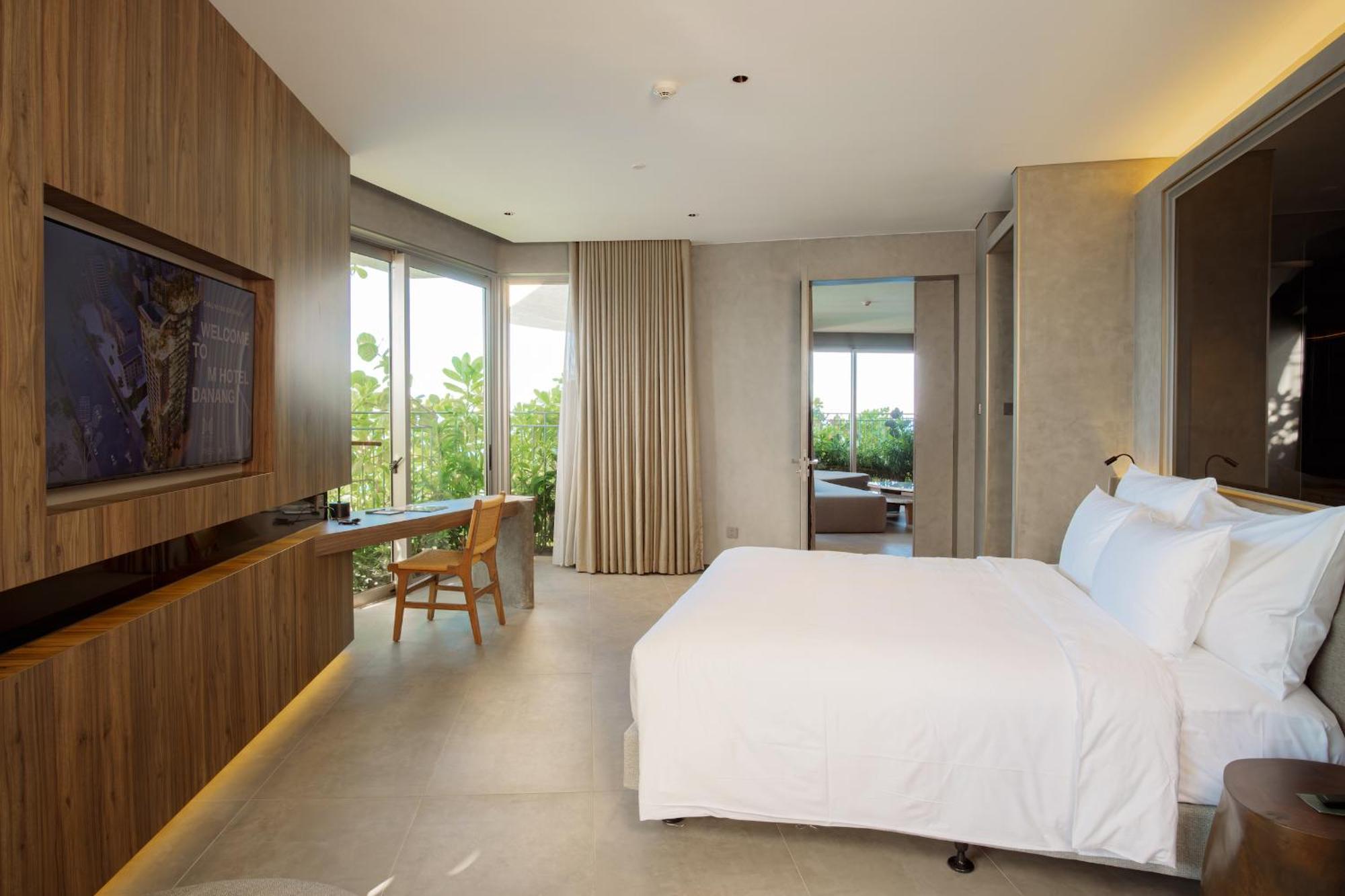 M Hotel Danang Exterior foto A bedroom at the hotel