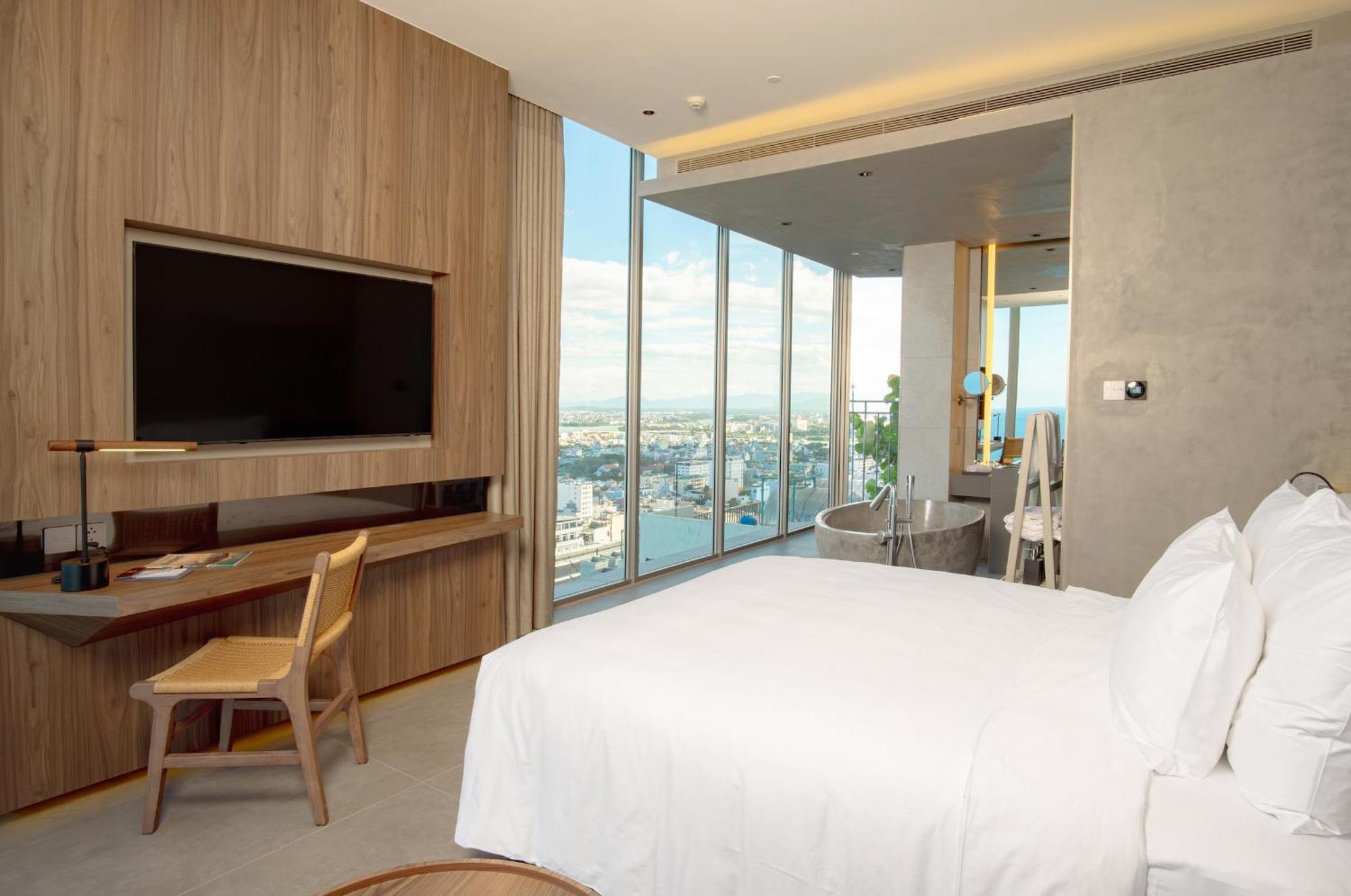 M Hotel Danang Exterior foto A bedroom at the hotel